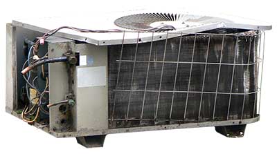 Image of a broken air conditioning unit that needs to be replace with a new ac system