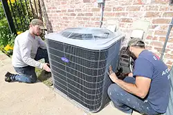 Extreme Comfort Air Conditioning & Heating technician delivering and installing new ac system in home