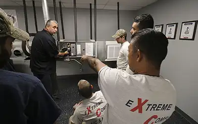 Extreme Comfort HVAC technicians training on AC Repair in Dallas