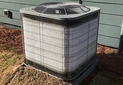 Failing AC system with ice forming on the outdoor compressor needing ac repair services