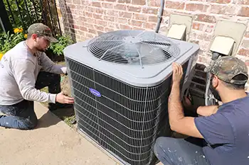 Extreme Comfort Air Conditioning and Heating technicians installing a New AC system in Plano TX