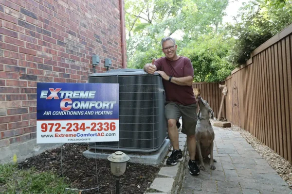 Homeowner with new AC system installed by Extreme Comfort AC