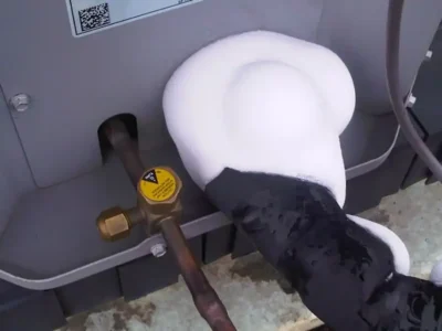 Frozen AC refrigerant line caused by low coolant or airflow issues